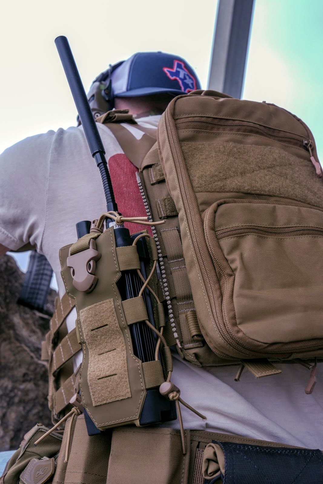RM-2 Ruggedized MANET Radio mounted on plate carrier in field